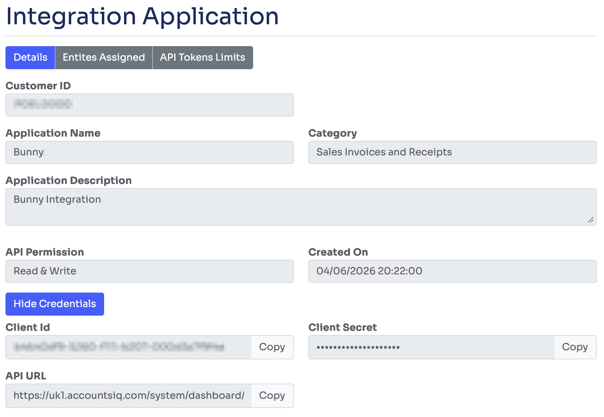 AccountsIQ Integration Application details page with Client Id and Client Secret fields and Copy buttons